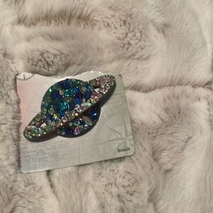 New! Never worn Cosmic brooch